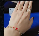 Customer wearing Dilaavez rings and bracelet