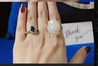 Customer wearing Dilaavez rings with thank-you card