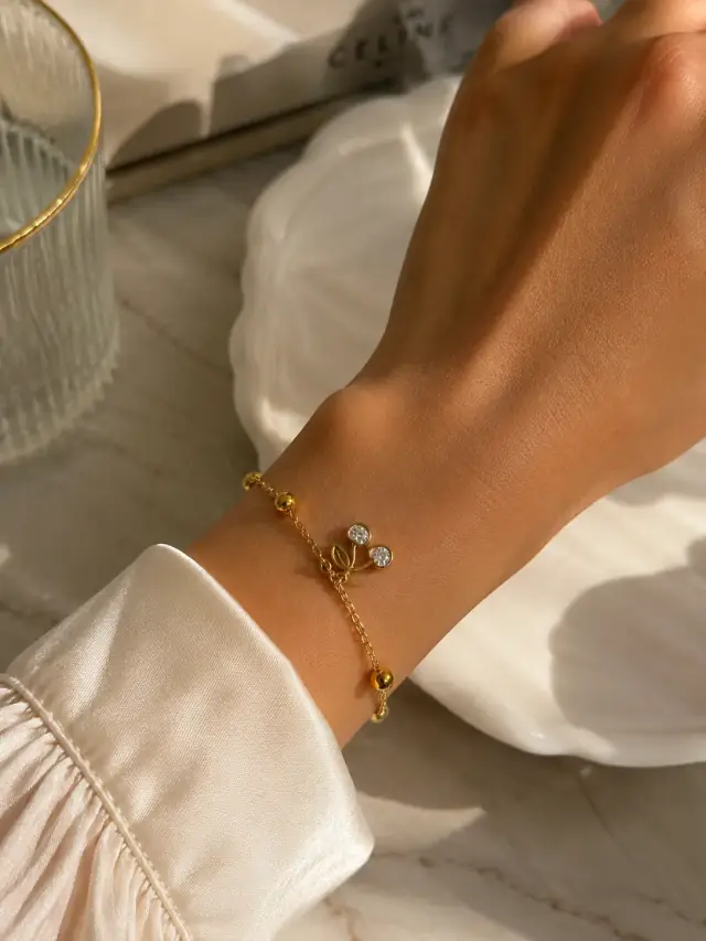 Cherry Glow Golden Charm Bracelet
