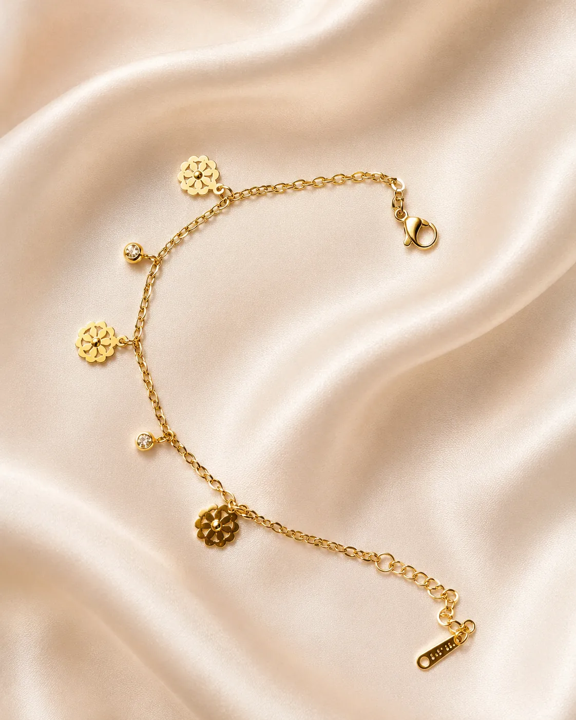 Golden Bloom Charm Bracelet, a gold-tone bracelet with floral charms