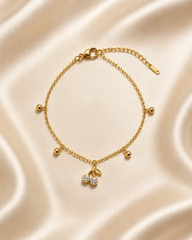 Cherry Glow Golden Charm Bracelet